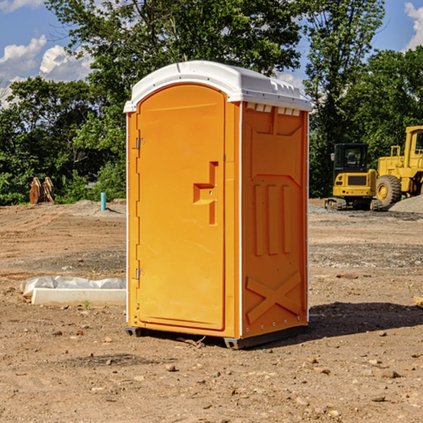 how often are the porta potties cleaned and serviced during a rental period in Freedom